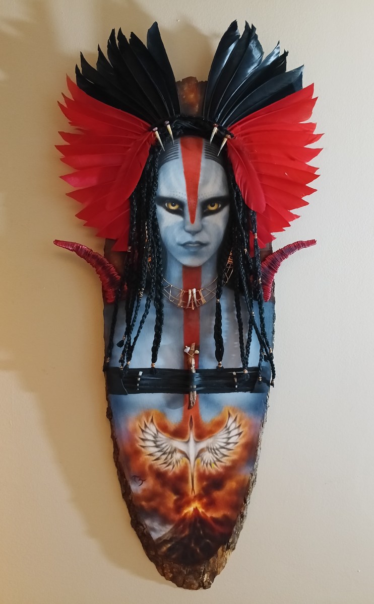 Varang of Avatar ~ Oil on wood, copper wire, mollusk shells, leather, feathers, wool hair 30x14 ~ $2200